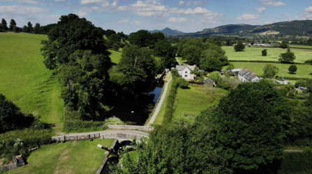 The Montgomery Canal runs through Montgomeryshire countryside, as well as towns and villages such as Welshpool, Berriew and Abermule