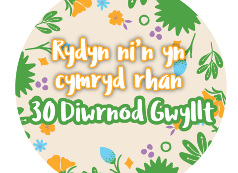 Illustrated social media badge which reads We're taking part in 30 Days Wild in Welsh