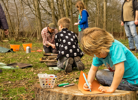 children playing in the woods